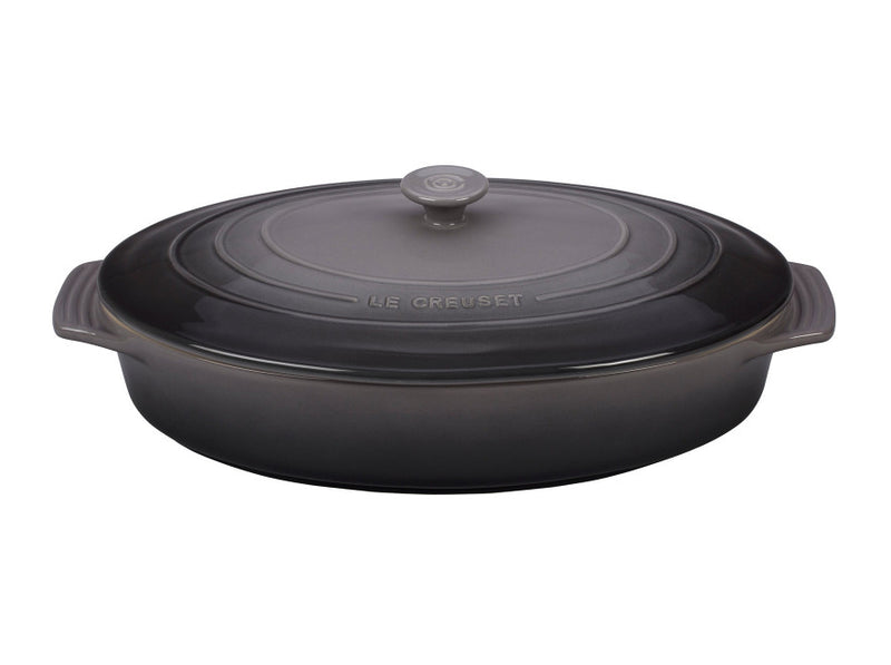 Load image into Gallery viewer, Le Creuset Covered Oval Casserole Dish 3 3/4 qt.
