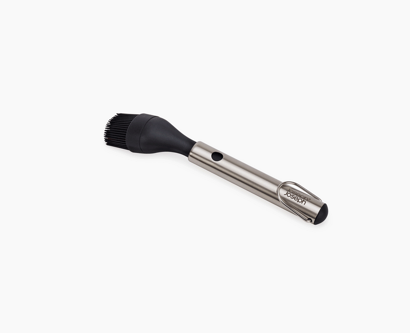 Load image into Gallery viewer, Joseph Joseph GrillOut™ Black BBQ Silicone Basting Brush with Extending Handle
