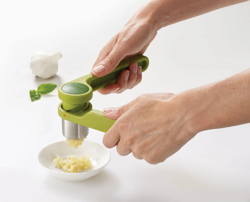 Load image into Gallery viewer, Joseph Joseph Helix Green Garlic Press
