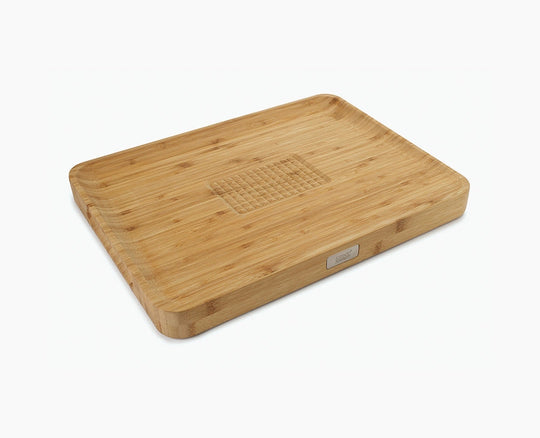 Load image into Gallery viewer, Joseph Joseph Cut&amp;Carve™ Bamboo Cutting Board

