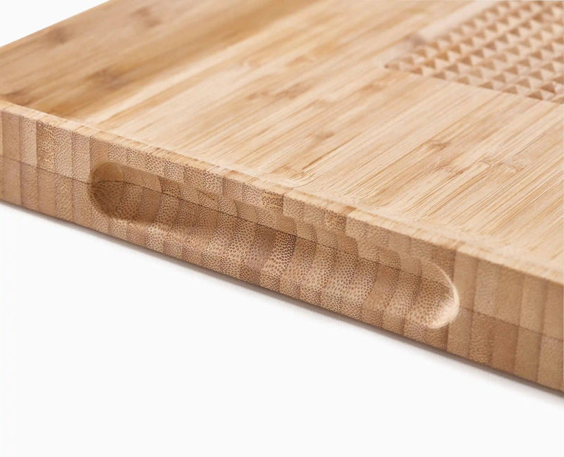 Load image into Gallery viewer, Joseph Joseph Cut&amp;Carve™ Bamboo Cutting Board
