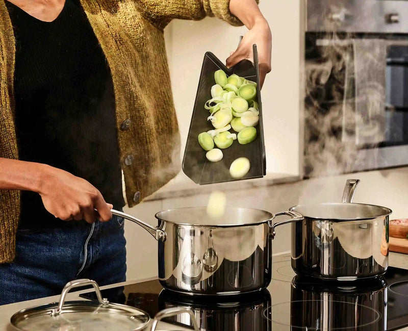 Load image into Gallery viewer, Joseph Joseph Chop2Pot™ Plus Folding Cutting Board
