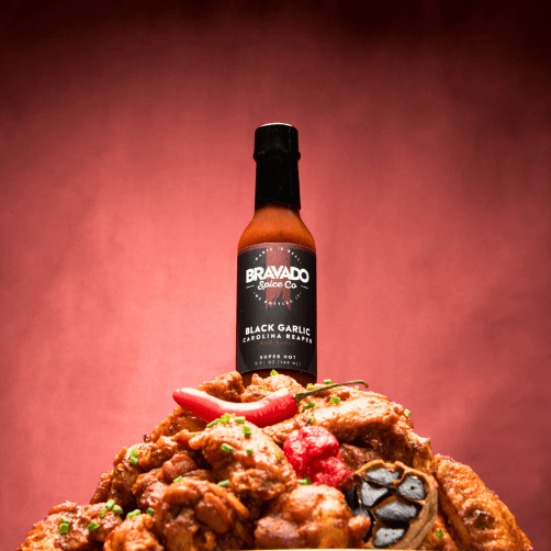 Load image into Gallery viewer, Bravado Spice Co Black Garlic Carolina Reaper Hot Sauce
