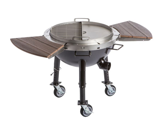 https://atlantagrillcompany.com/cdn/shop/files/Tailgater-Fire-Pit-Rotating-Grill-and-Griddle-Prep-Wings-Casters_535x.jpg?v=1686340824